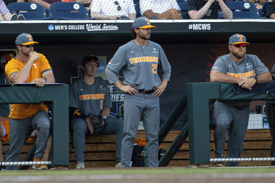 FILE - Tennessee head coach Tony Vitello watches the action in the dugout against LSU in the first inning in a baseball game at the NCAA College World Series in Omaha, Neb., Tuesday, June 20, 2023. No. 1 national seed Tennessee has established itself as the dominant post-pandemic program. All that’s missing is a national title. (AP Photo/John Peterson, File)