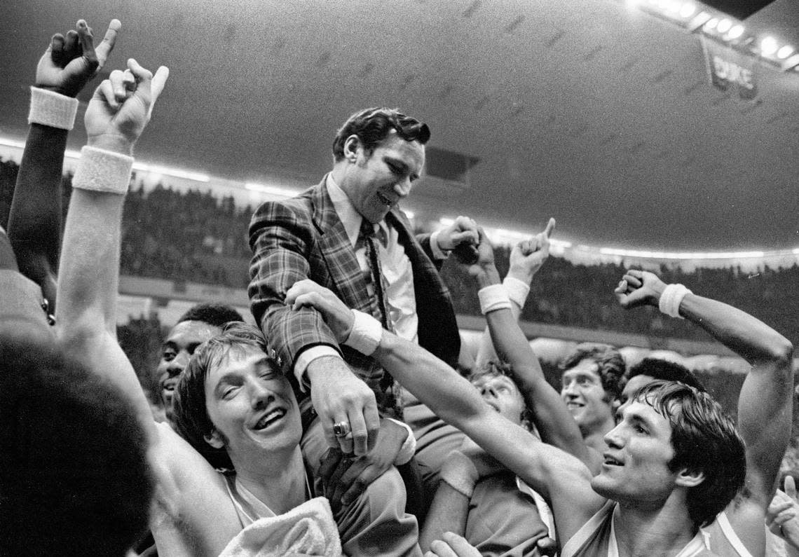 UNC players celebrate with coach Dean Smith after winning the 1972 ACC Tournament Championship game in Greensboro.