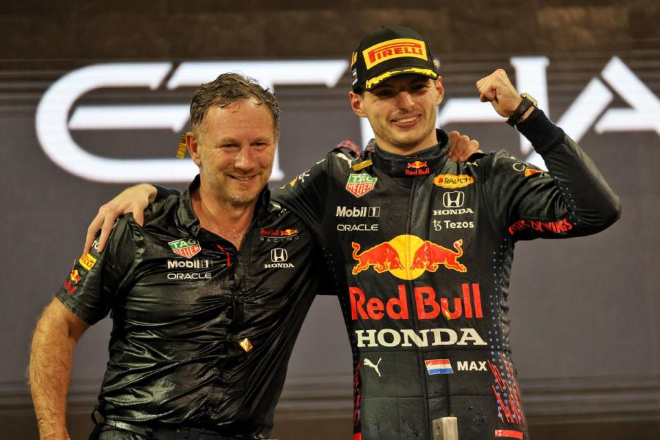 Horner celebrates Max Verstappen’s first title in 2021 (PA)