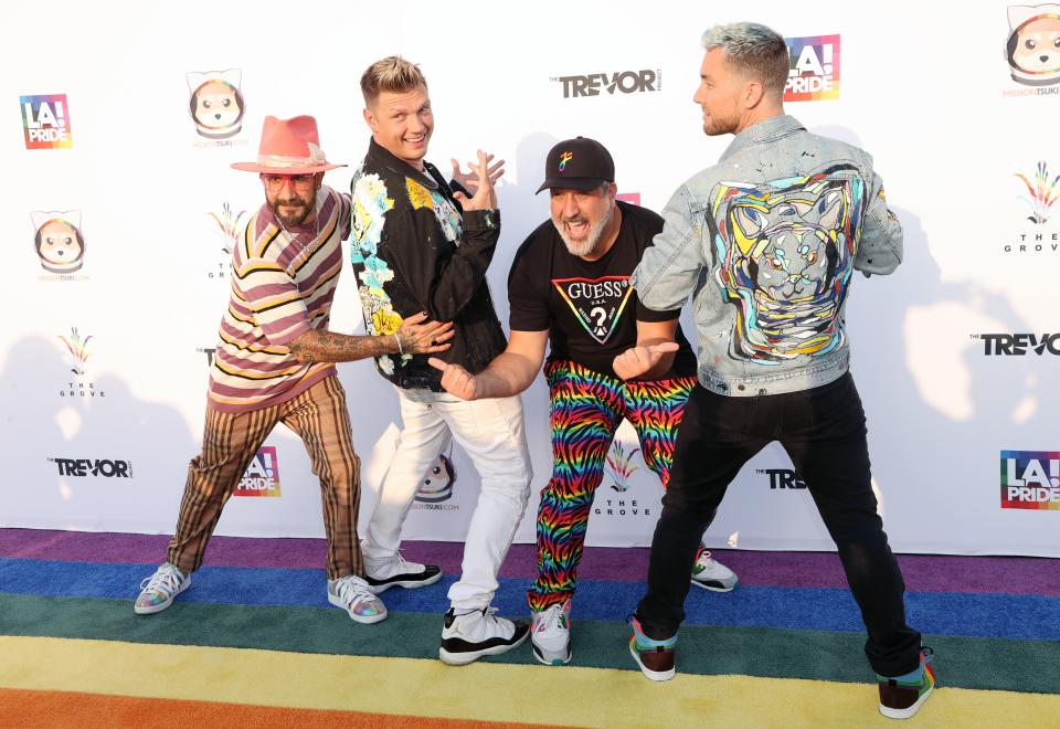 (L-R) AJ McLean and Nick Carter of Backstreet Boys and Joey Fatone and Lance Bass of NSYNC attend "Bingo Under The Stars" at The Grove on June 18, 2021 in Los Angeles, California.