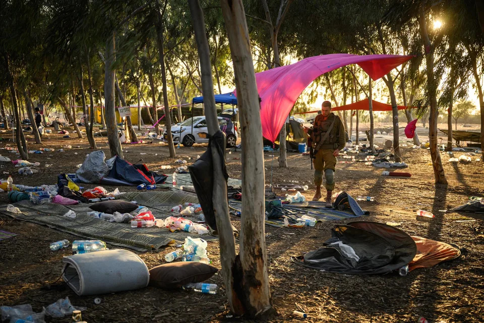 Security forces search for identification and personal items at the Nova music festival site, in Kibbutz Re'im, Israel, on Oct. 12, 2023. <span class="copyright">Leon Neal—Getty Images</span>