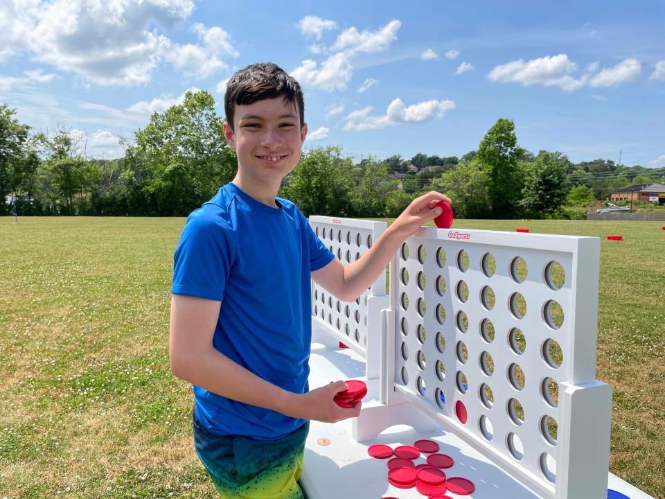 Vincent Murphy, 13, hones his Four Square skills at the first Spring Lawn Games Festival held at Carl Cowan Park Sunday, May 22, 2022.