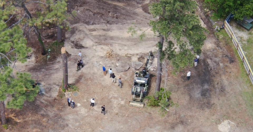An aerial shot taken this week shows a section of land near Jackson and Calhoun streets that authorities searched in the hunt for clues to a man missing since 2002.