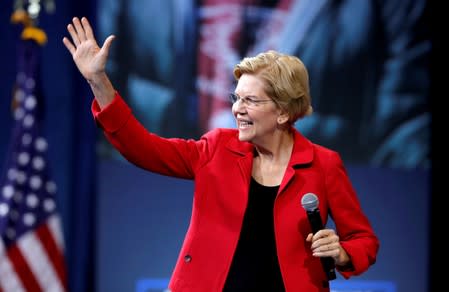 FILE PHOTO: FILE PHOTO: U.S. Democratic presidential candidate Senator Warren (D-MA) arrives onstage during a forum held by gun safety organizations the Giffords group and March For Our Lives in Las Vegas