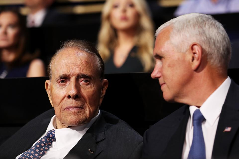 Bob Dole, left, with Mike Pence in July 2016. Credit: John Moore/Getty Images