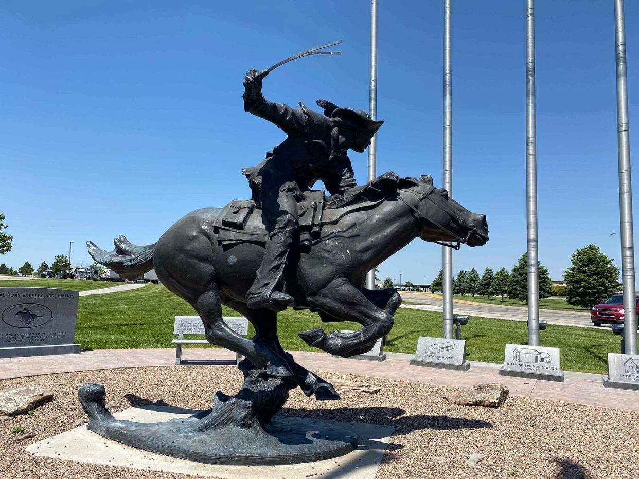 The National Pony Express Monument, Sidney, Nebraska, side of statue, on a bright sunny day