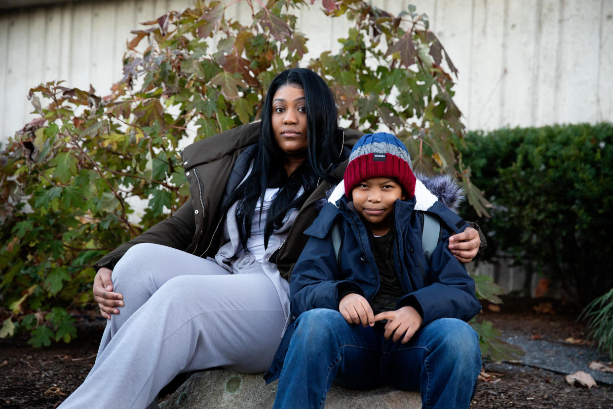 Amina Scott and her son, Yasin, 8, pose for a portrait together on Nov. 24 in Boston. (Photo: Kayana Szymczak for HuffPost)