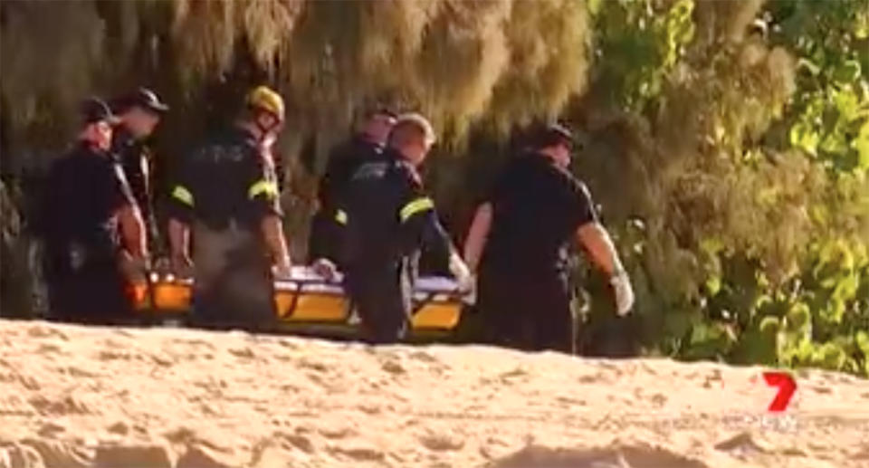 He was stretchered to safety and taken to Hervey Bay hospital without serious injury. Source: 7 News