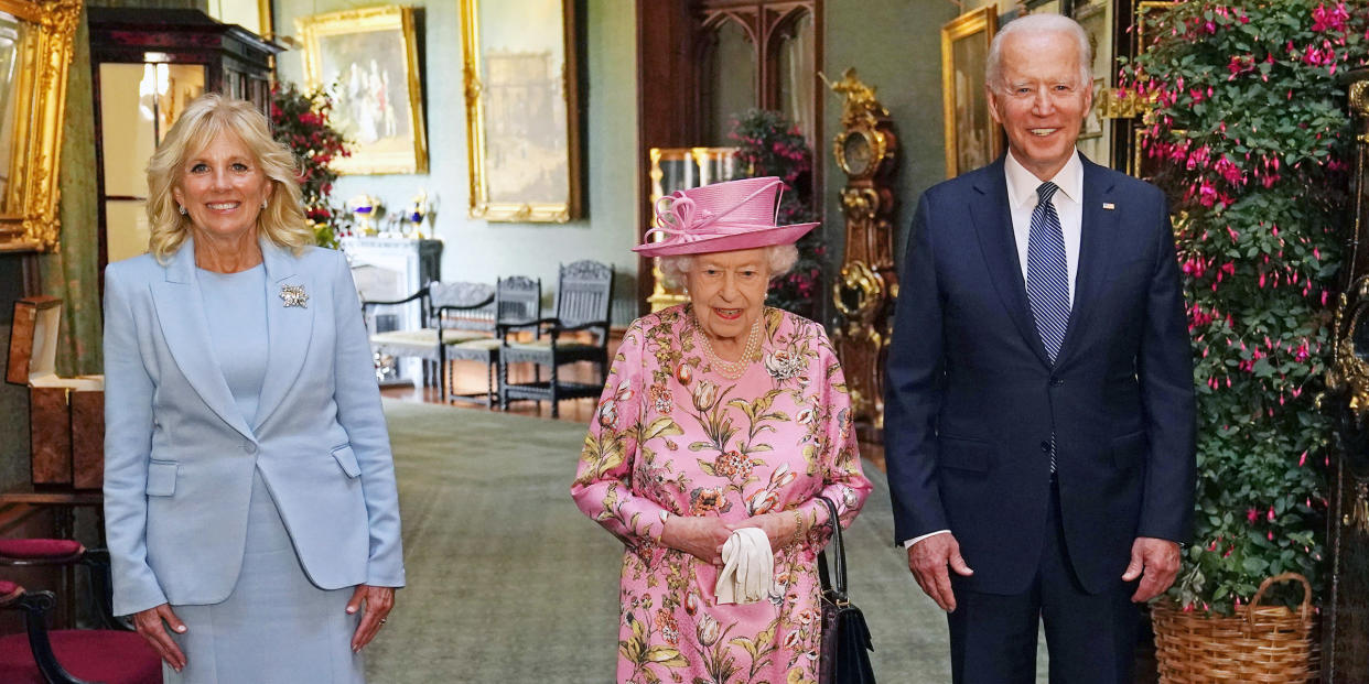 Queen Elizabeth II with President Biden and first lady Jill Biden during their visit to Windsor Castle on June 13, 2021, in Windsor, England. (Steve Parsons / Getty Images)