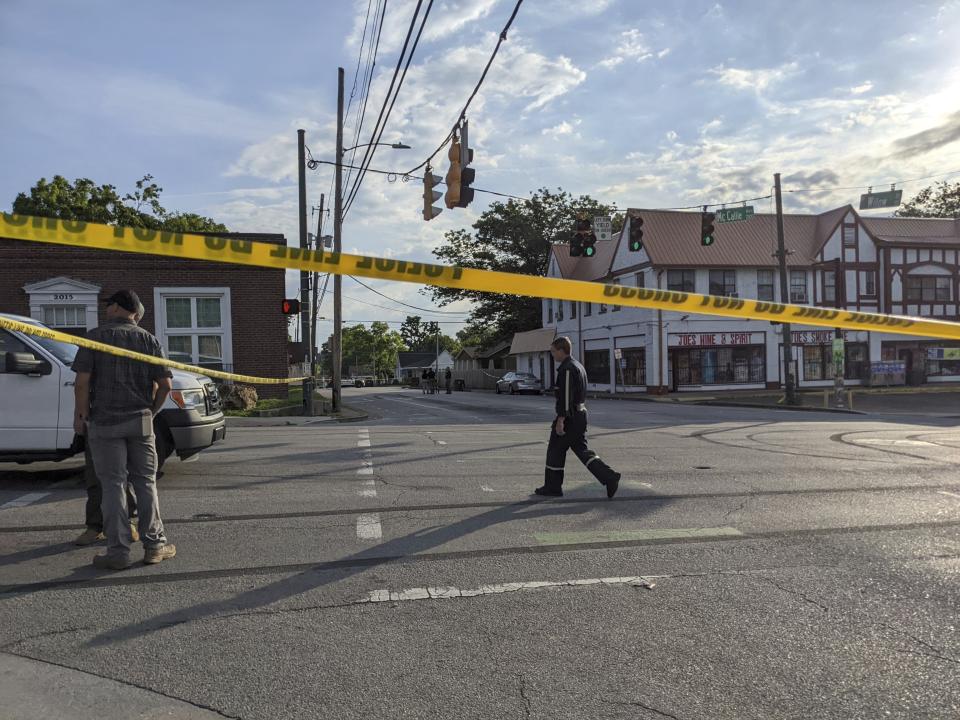 The Chattanooga Police Department investigate the scene following a shooting on Sunday, June 5, 2022, in Chattanooga, Tenn. (Tierra Hayes/Chattanooga Times Free Press via AP)