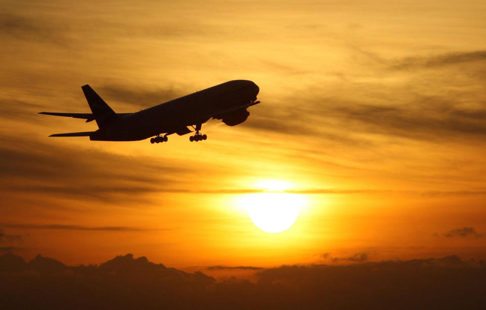 File photo dated 19/11/08 of a plane taking off at sunset. Just over �1 billion is being withheld in partial or full refunds from package holiday customers who have asked for their money back, according to estimates from Which?