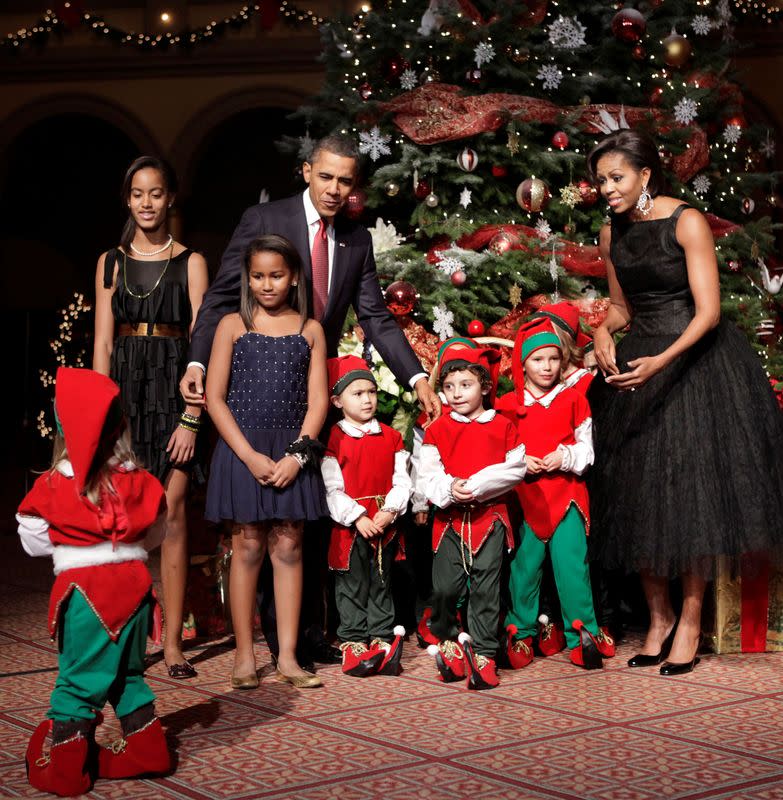 FILE PHOTO: President Barack Obama and first lady Michelle Obama attend the Christmas in Washington Celebration