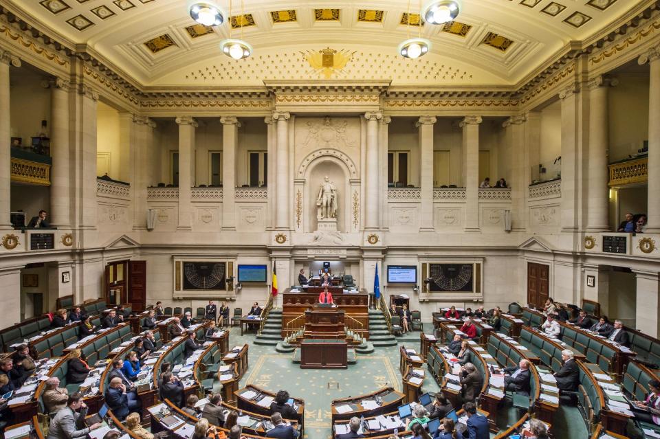 Belgian politicians debate the bill on child euthanasia at the Belgian federal parliament in Brussels, Wednesday Feb. 12, 2014. Belgium, one of the very few countries where euthanasia is legal, is expected to take the unprecedented step this week of abolishing age restrictions on who can ask to be put to death, extending the right to children. The legislation appears to have wide support in the largely liberal country. But it has also aroused intense opposition from foes, including a list of paediatricians, and everyday people who have staged street protests, fearing that vulnerable children will be talked into making a final, irreversible choice. (AP Photo/Geert Vanden Wijngaert)