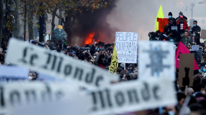 FILE PHOTO: Protests over proposed curbs on identifying police, in Paris