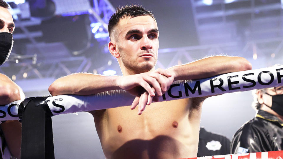 Andrew Moloney leans on the ropes as he waits for a decision after the fight with Joshua Franco.