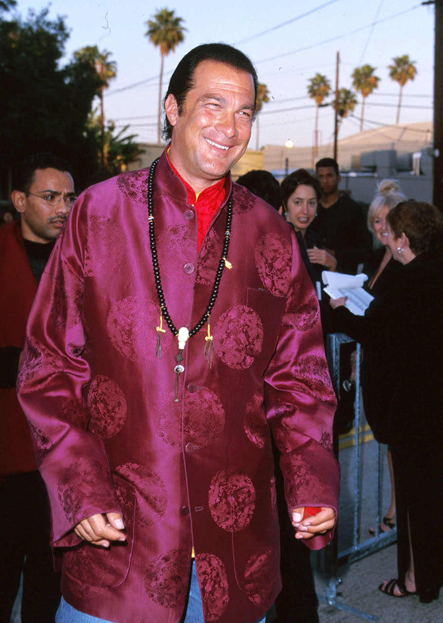 <p>Silky smooth</p><p>Steven Seagal – supposedly a <a href="http://ultraculture.org/blog/2012/12/28/the-buddha-nature-of-steven-seagal/" rel="nofollow noopener" target="_blank" data-ylk="slk:reincarnated Tibetan lama;elm:context_link;itc:0;sec:content-canvas" class="link ">reincarnated Tibetan lama</a> – has always had an affinity for Eastern spirituality, and his wardrobe reflects it. (Photo: Sam Levi/WireImage)</p>