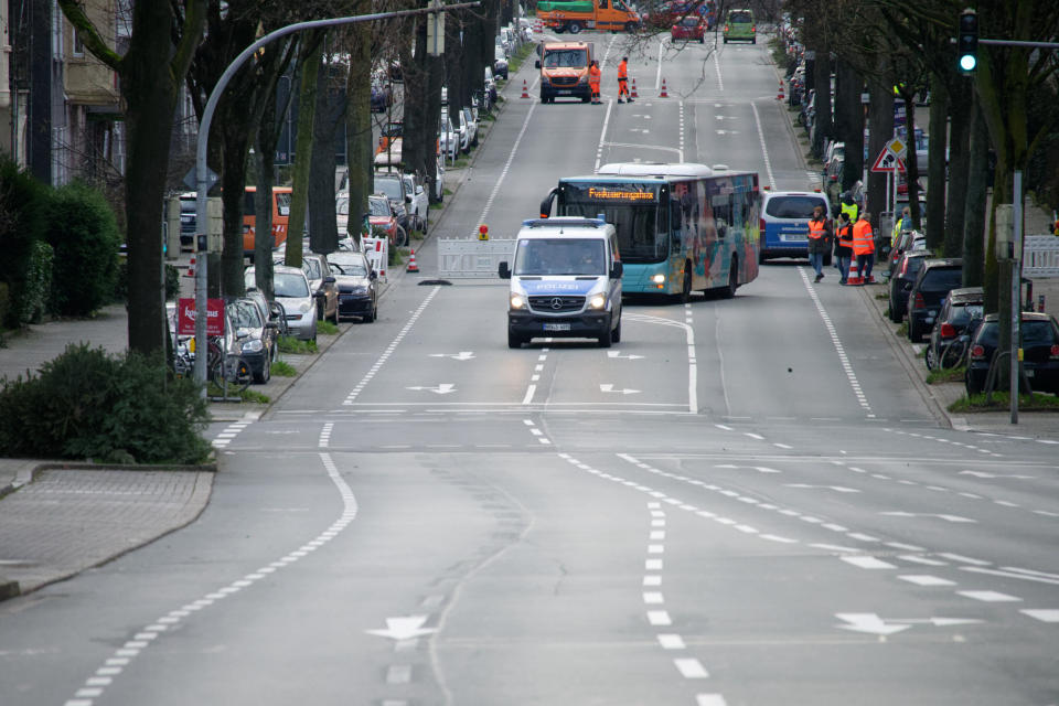 A road is closed for public traffic in Dortmund, Germany, Sunday, Jan. 12, 2020. Thousands of people are evacuating in the western Germany city of Dortmund as experts are getting ready to defuse up to four bombs from World War II. (Henning Kaiser/dpa via AP)