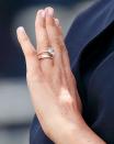 <p>The royal made her first public appearance after the birth of her son at the 2019 Trooping of the Colour ceremony, and fans were quick to notice something different about Markle's left finger. The Duchess of Sussex debuted a <a href="https://www.townandcountrymag.com/style/jewelry-and-watches/a28157762/meghan-markle-redesigned-engagement-ring-photos/" rel="nofollow noopener" target="_blank" data-ylk="slk:revamped engagement ring;elm:context_link;itc:0;sec:content-canvas" class="link ">revamped engagement ring</a>—replacing the original gold band with a thinner band of pavé diamonds—as well as a new diamond eternity band on her stack. </p>