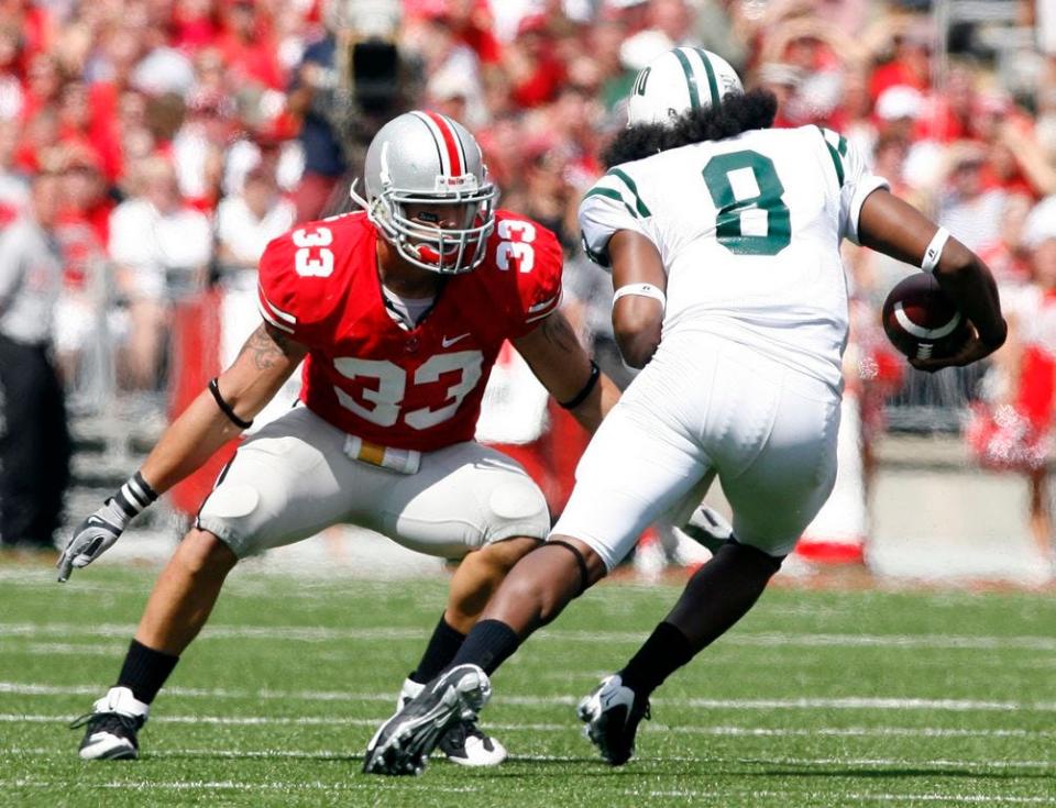 Ohio State's James Laurinaitis tackles Ohio's Boo Jackson during the 2nd half of their game against Ohio at Ohio Stadium September 6, 2008.