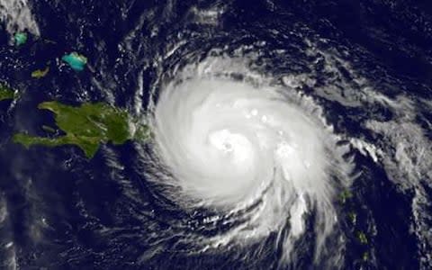 This Nasa satellite image shows Hurricane Maria over Puerto Rico - Credit: JOSE ROMERO/AFP