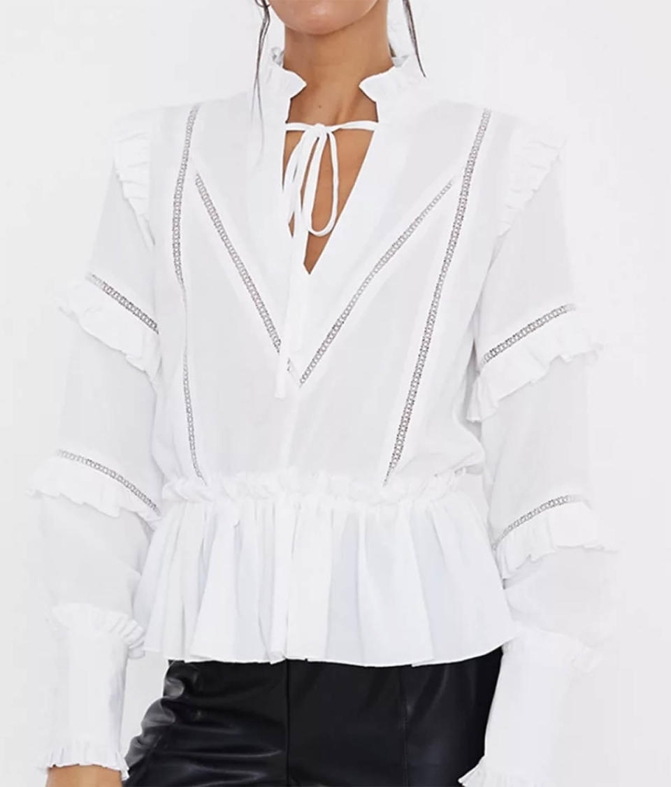 In The Style x Lorna Luxe ruffle trim blouse in white, $70 from ASOS