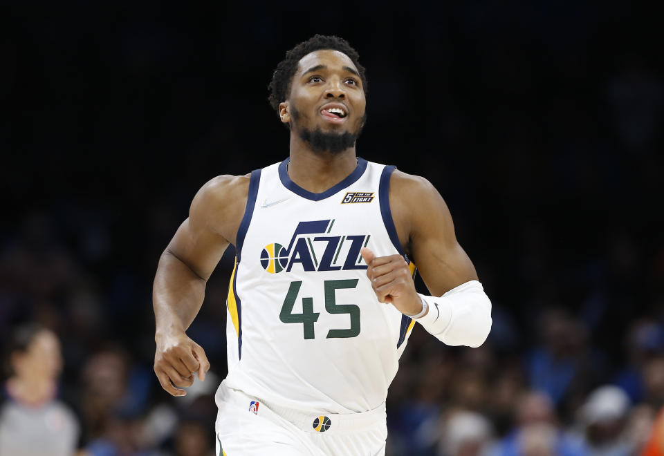 Mar 6, 2022; Oklahoma City, Oklahoma, USA; Utah Jazz guard Donovan Mitchell (45) smiles after scoring against the Oklahoma City Thunder during the second quarter at Paycom Center. Mandatory Credit: Alonzo Adams-USA TODAY Sports