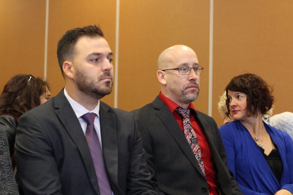 Mathieu Boudreau, left, and Patrick Bulger shown in 2019 during a hearing about whether they should keep their jobs.