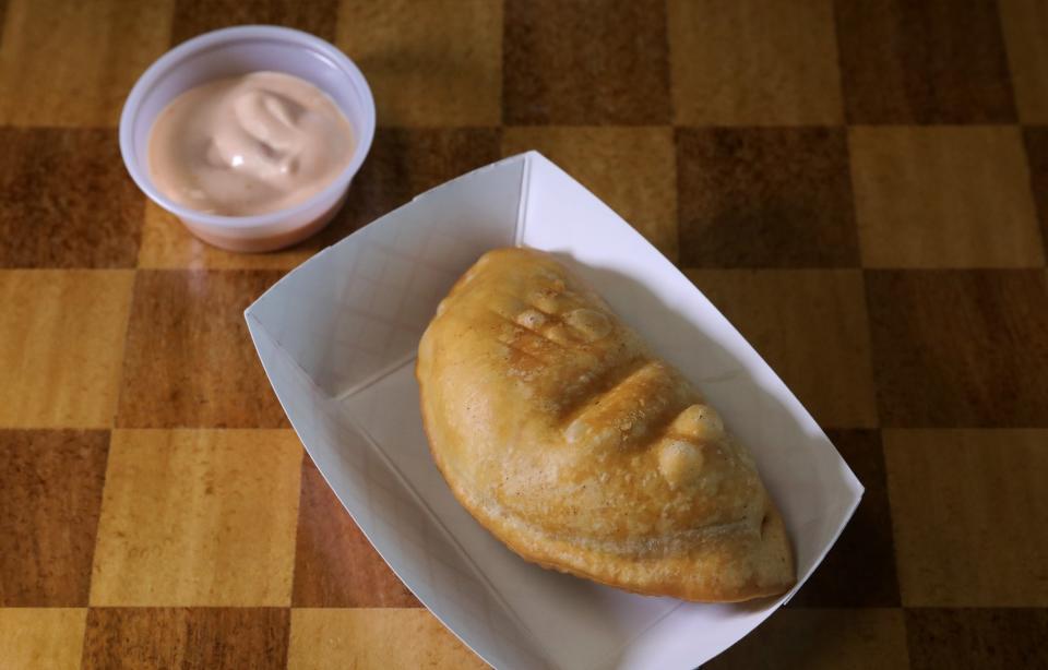 A beef empanadilla at Carmen's Cooking, located in the Brighton Commons Thursday, Dec. 16, 2021 in Brighton.