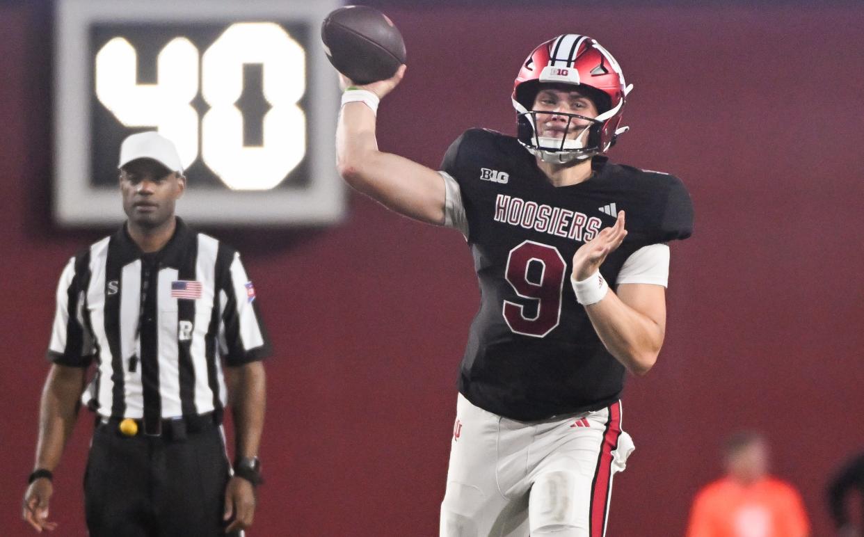 Indiana Hoosiers quarterback Kurtis Rourke (9) throws a pass during the Indiana football spring game at Memorial Stadium on Thursday, April 18, 2024.