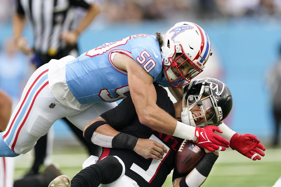 Atlanta Falcons quarterback Desmond Ridder (9) is hit by Tennessee Titans linebacker Jack Gibbens (50) during the first half of an NFL football game, Sunday, Oct. 29, 2023, in Nashville, Tenn. (AP Photo/George Walker IV)