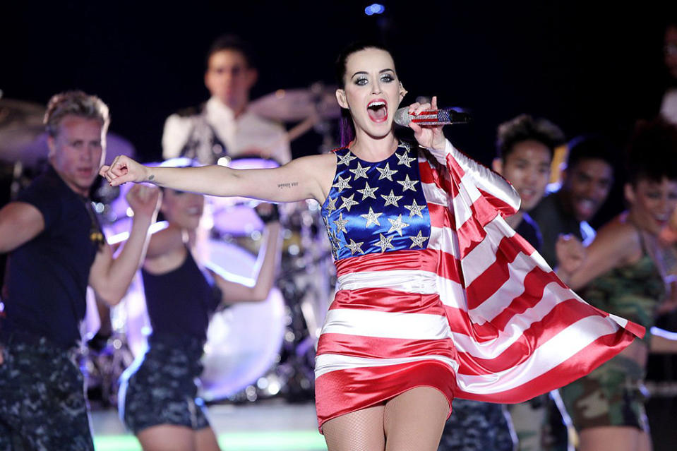 Katy Perry wears a patriotic dress as she performs at a Pepsi-sponsored event at Brooklyn Pier 9A, kicking off Fleet Week in New York. Perry’s “Wide Awake,” was the top downloaded song on iTunes for the week ending July 9, 2012.