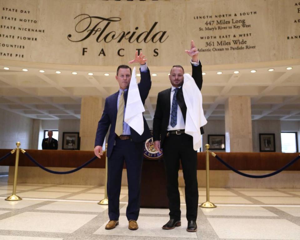 Sergeant at Arms for the House, Russell Hosford, and Tim Hay for the Senate, drop handkerchiefs during the “sine die” ceremony, Saturday, May 4, 2019 to end the annual legislative session in Tallahassee. “Sine die” is a Latin term that means a meeting is adjourned indefinitely or without a future date.