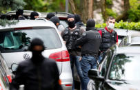 Investigators are seen during a police operation in Oullins, near Lyon, France May 27, 2019. REUTERS/Emmanuel Foudrot