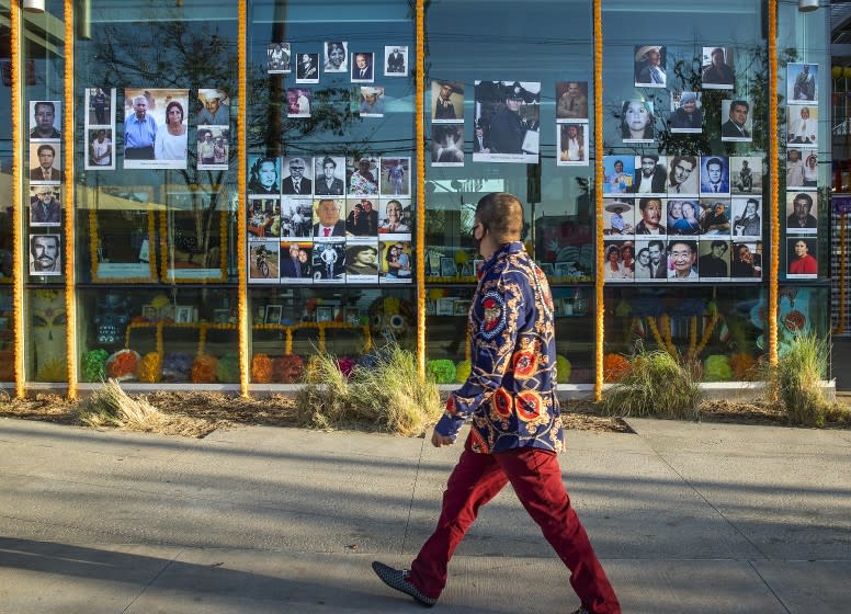 PACOIMA, CA - NOVEMBER 12, 2020: A Day of the Dead altar located at the office of Los Angeles City Councilwoman Monica Rodriguez at Pacoima City Hall on Van Nuys Blvd. honors those killed by COVID-19 and others who have died from different causes. (Mel Melcon / Los Angeles Times)