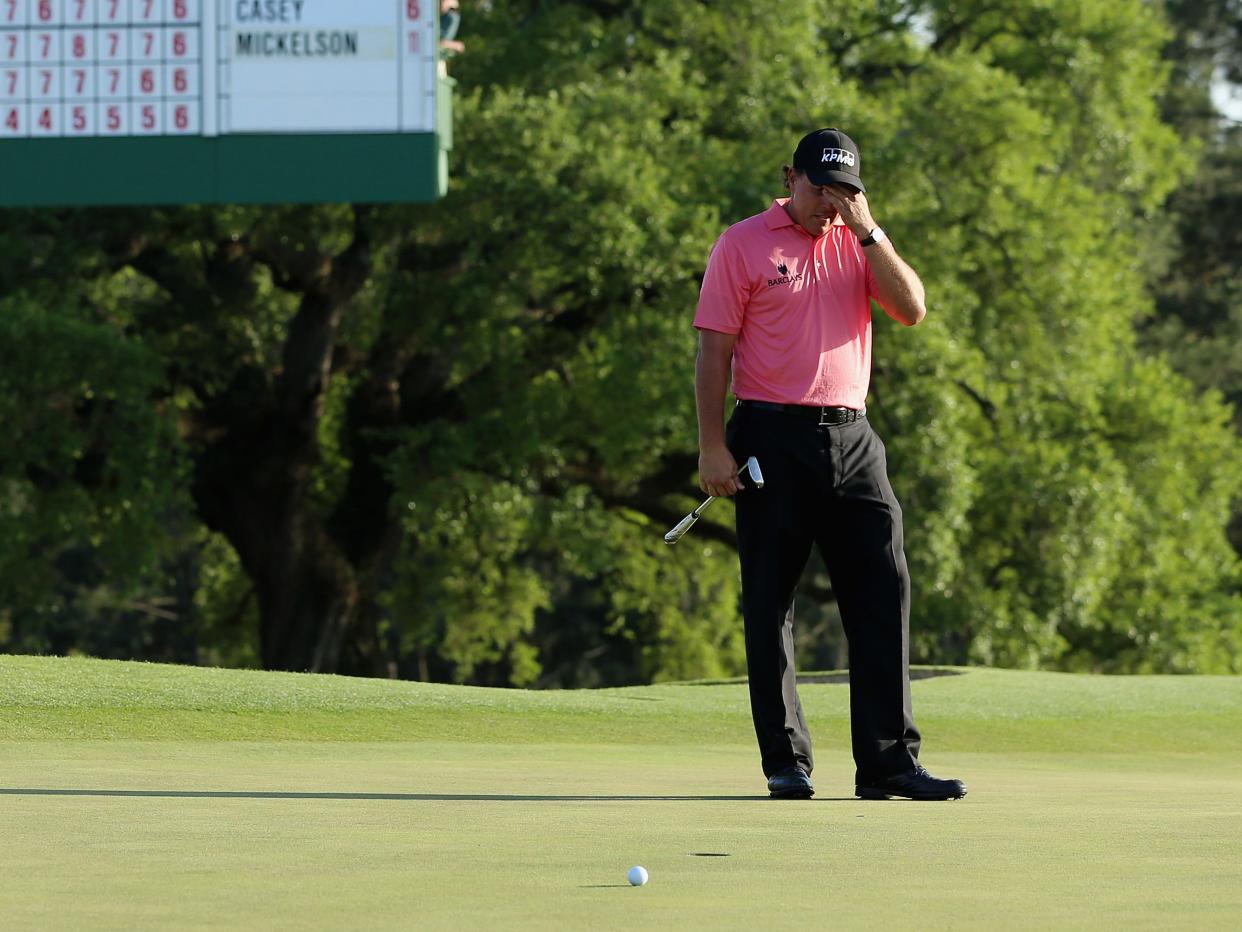 Phil Mickelson reacts to missed putt at the Masters.