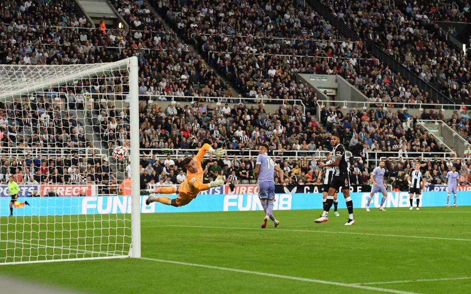 Karl Darlow of Newcastle United dives but fails to save as Raphinha of Leeds United scores - Stu Forster/Getty Images