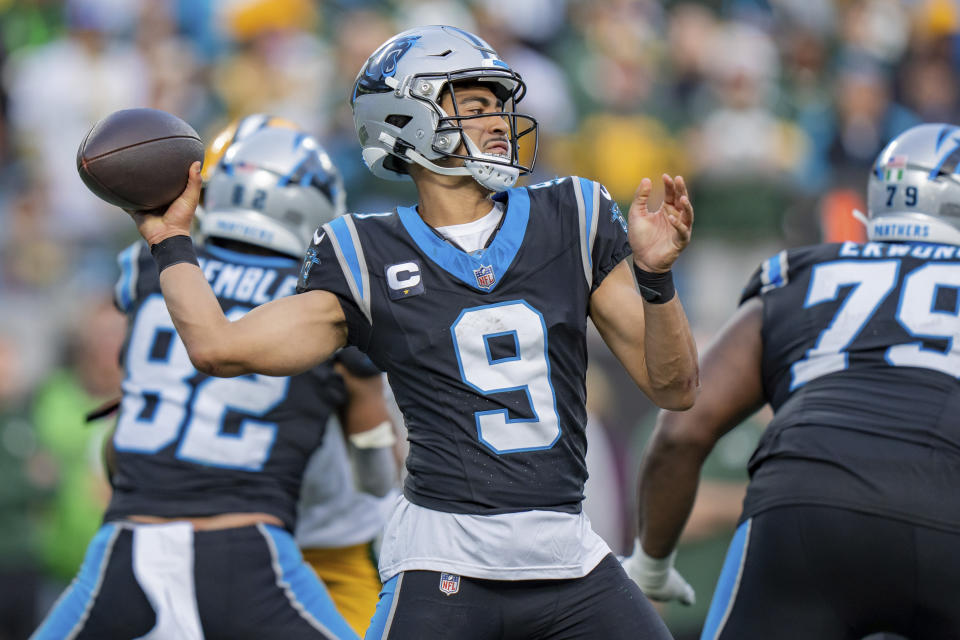 FILE - Carolina Panthers quarterback Bryce Young (9) throws a pass during an NFL football game against the Green Bay Packers, Sunday, Dec. 24, 2023, in Charlotte, N.C. The Panthers have surrounded Young with highly paid offensive linemen and some new offensive weapons including Diontae Johnson after a season in which they went 2-15. (AP Photo/Jacob Kupferman, File)