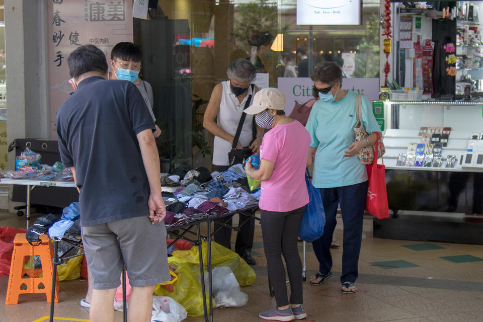 A vendor selling face masks seen at the Clementi Town Centre on 19 June 2020. (PHOTO: Dhany Osman / Yahoo News Singapore)