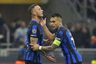 Inter Milan's Marko Arnautovic, left, reacts after missing to score besides team mate Inter Milan's Lautaro Martinez during the Champions League, round of 16, first leg soccer match between Inter Milan and Atletico Madrid, at the San Siro stadium in Milan, Italy, Tuesday, Feb. 20, 2024. (AP Photo/Luca Bruno)