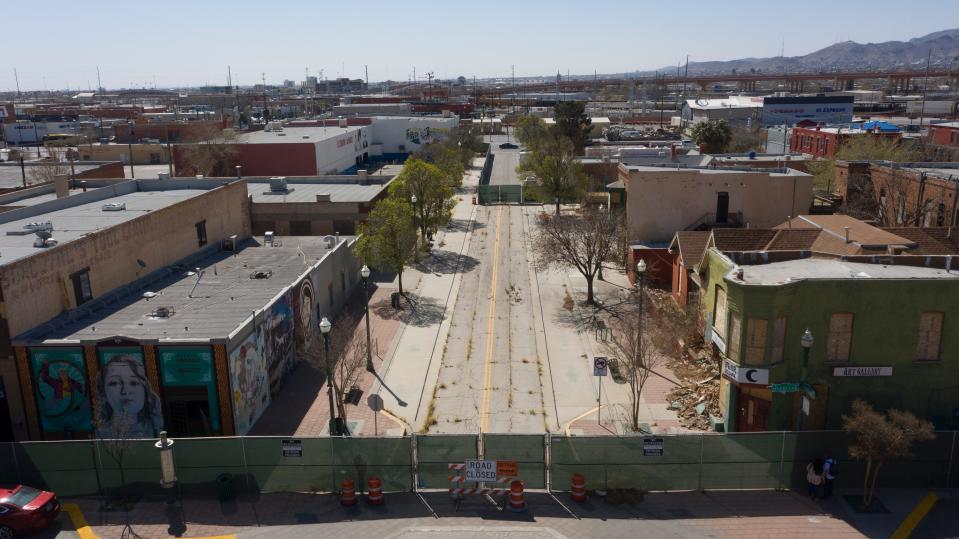 Weeds grow in the street in the Duranguito neighborhood in Downtown El Paso, photographed March 19, 2021.