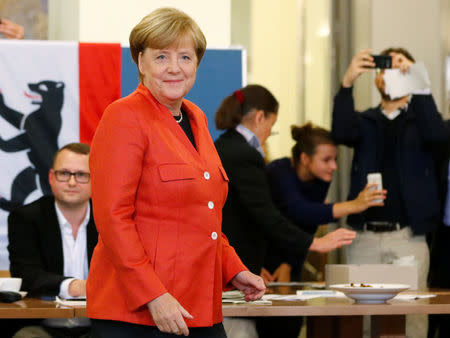 German Chancellor and leader of the Christian Democratic Union CDU Angela Merkel is seen after casting her vote in the general election (Bundestagswahl) in Berlin, Germany, September 24, 2017. REUTERS/Fabrizio Bensch