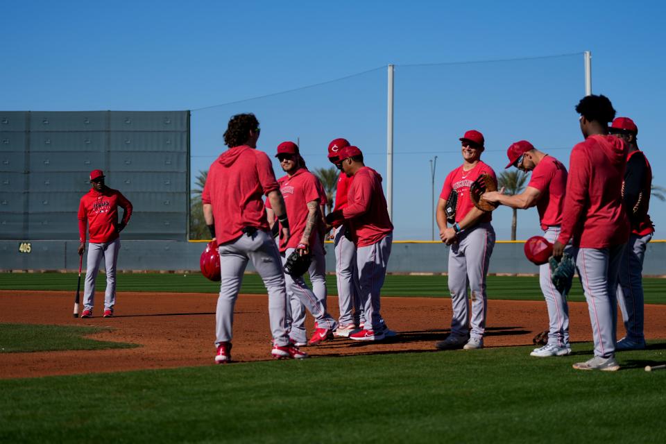 Eric Davis works with a group of young players at the Cincinnati Reds Player Development Complex in Goodyear, Ariz., on Monday, Feb. 20, 2023.