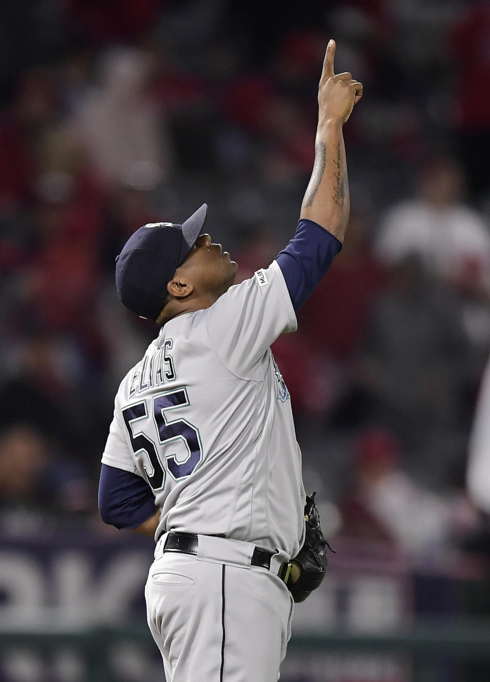 Seattle Mariners relief pitcher Roenis Elias gestures as the Mariners defeated the Los Angeles Angels 5-3 in a baseball game Friday, April 19, 2019, in Anaheim, Calif. (AP Photo/Mark J. Terrill)