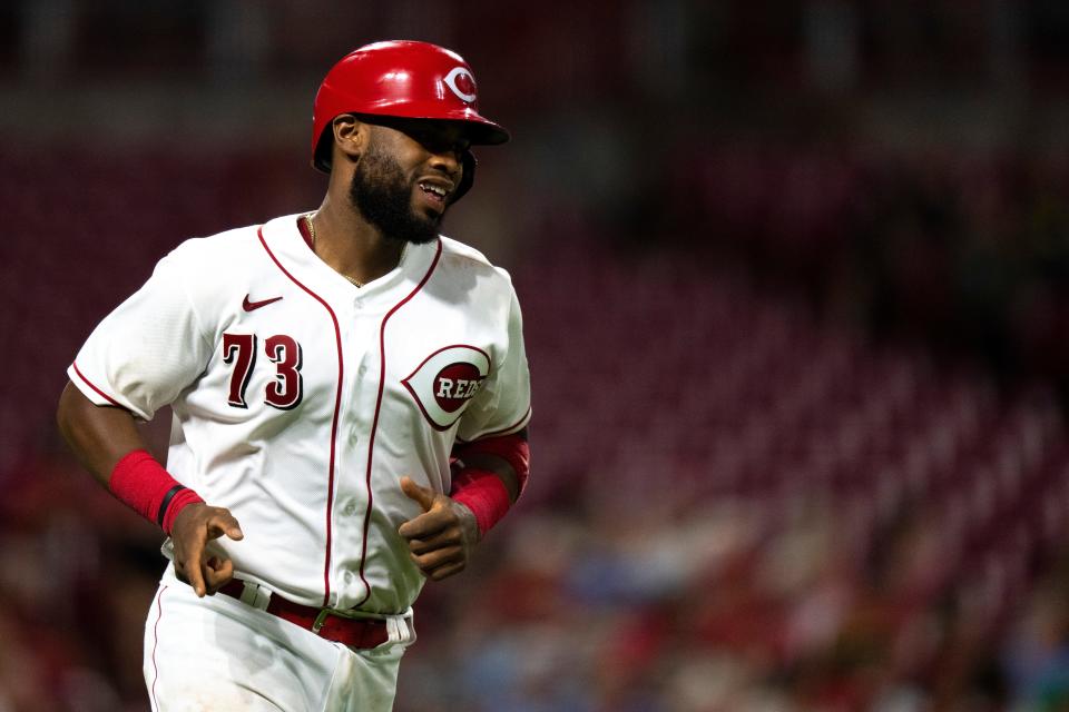 Cincinnati Reds catcher Chuckie Robinson (73) smiles after hitting a 2-run home run in the fifth inning of the MLB game between the Cincinnati Reds and St. Louis Cardinals at Great American Ball Park in Cincinnati on Monday, Aug. 29, 2022.