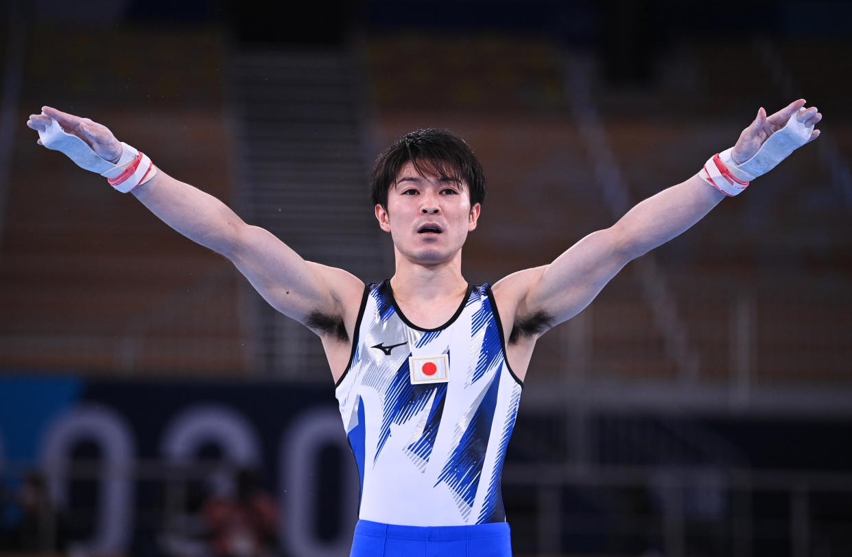 Kohei Uchimura of Japan pictured after competing on — and slipping from — the horizontal bar. He, like Simone Biles, is frequently referred to as the 