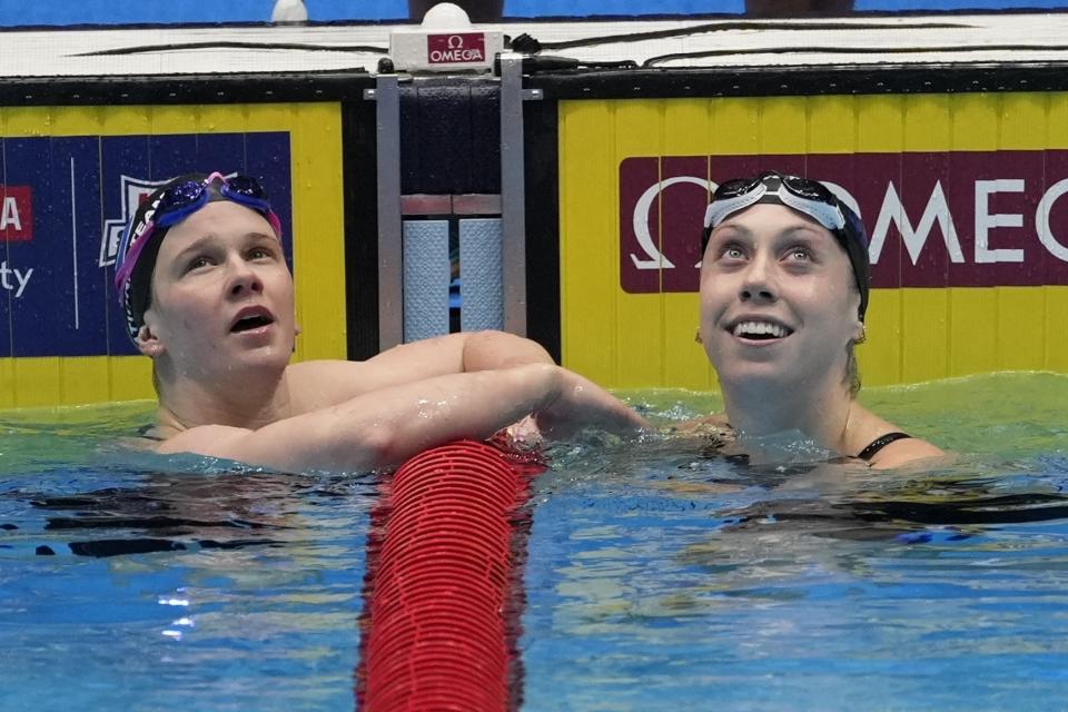 Gretchen Walsh and Alex Shackell watch results after the Women's 100 Butterfly Saturday, June 15, 2024, at the US Swimming Olympic Trials in Indianapolis. (AP Photo/Darron Cummings)