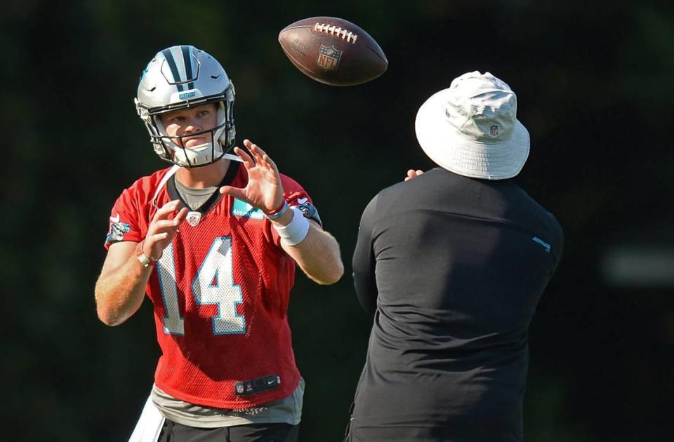 Carolina Panthers quarterback Sam Darnold catches a snap prior to passing during a drill on Wednesday, July 28, 2021. The Panthers are holding training camp at Wofford College in Spartanburg, SC.