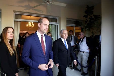 Britain's Prince William walks with Israeli Prime Minister Benjamin Netanyahu during a reception at the British ambassador residence in Ramat Gan, Israel June 26, 2018. Sebastian Scheiner/Pool via Reuters