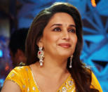 Madhuri looks 'perfect' in a yellow saree.