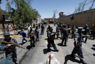 <p>Afghan policemen inspect at the site of a blast in Kabul, Afghanistan, May 31, 2017. (Mohammad Ismail/Reuters) </p>